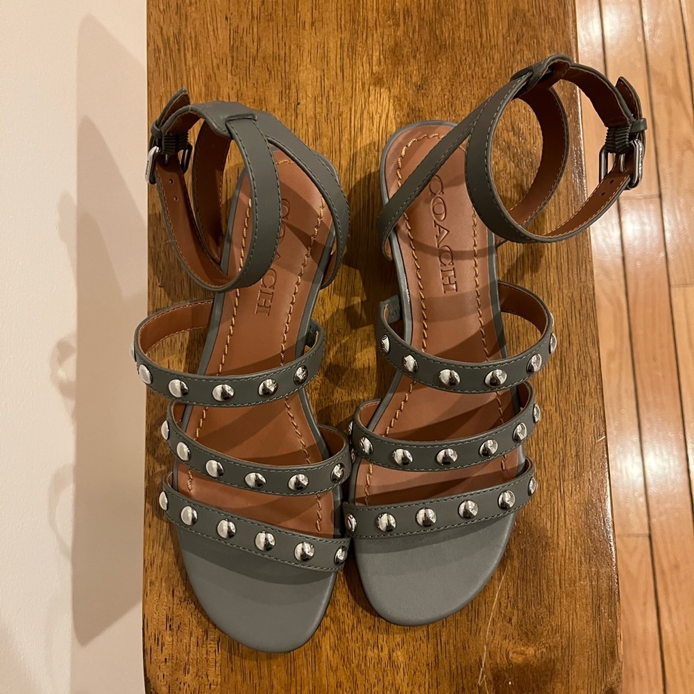 Coach Never Worn grey studded ankle strap sandal. Low wedge 1 inch heel